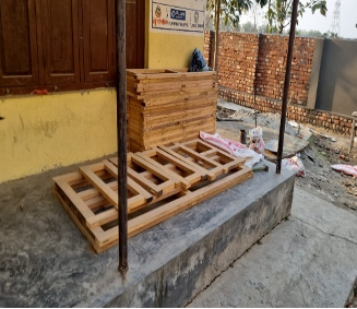 Wooden framework placed outside the construction site.