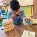 A children using microscope